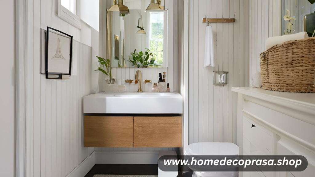 In small bathrooms, number of vanities can overwhelm the space. Instead, opt for a pedestal or wall-mounted sink like designer Kristina Phillips used in a narrow powder room. These slim fixtures create a feeling of openness and make it easier to move around.